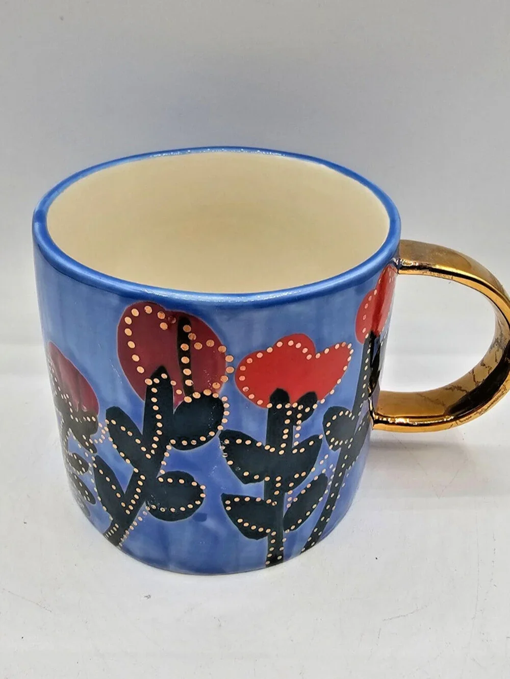 Anthropologie Francesca Kaye Atelier floral mug with a blue body